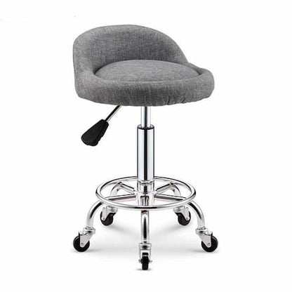 Tabouret à roulettes avec assise matelassée réglable et armature en inox