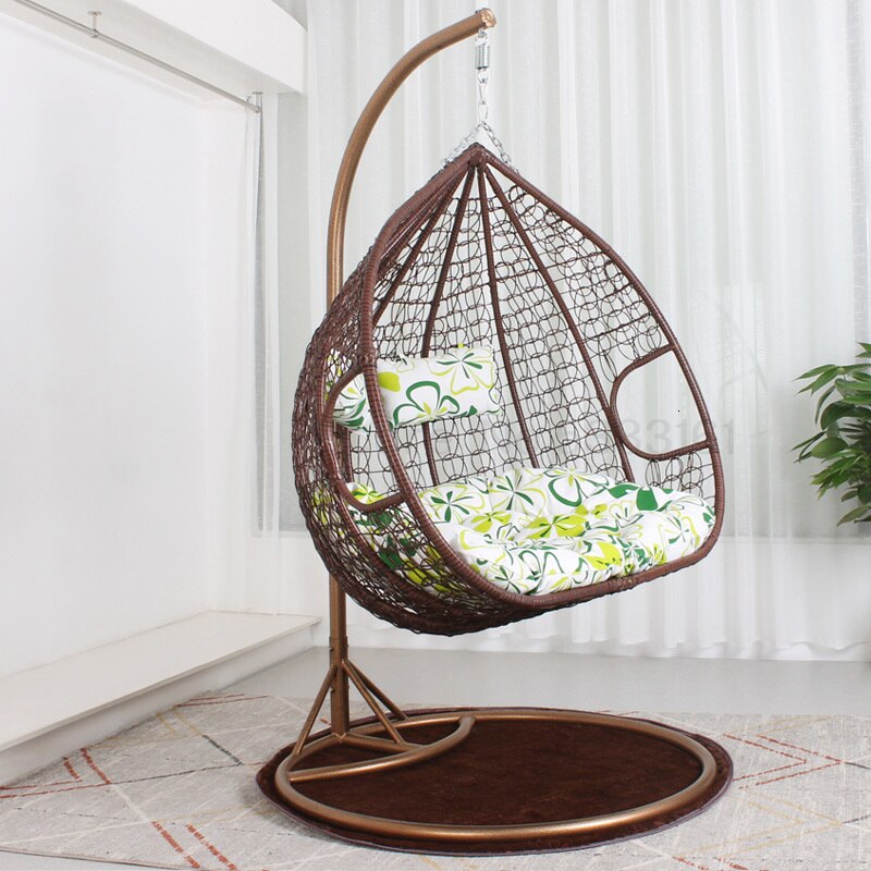 Chaise suspendue en rotin renforcé double coussin et socle en carbone