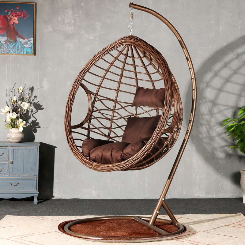 Chaise suspendue en rotin renforcé double coussin et socle en carbone