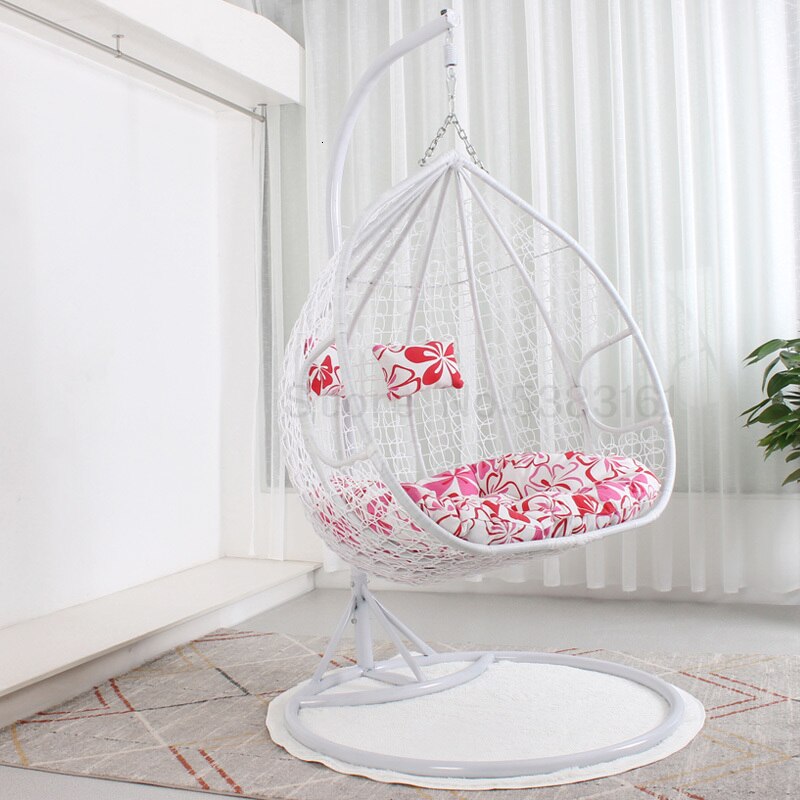 Chaise suspendue en rotin renforcé double coussin et socle en carbone