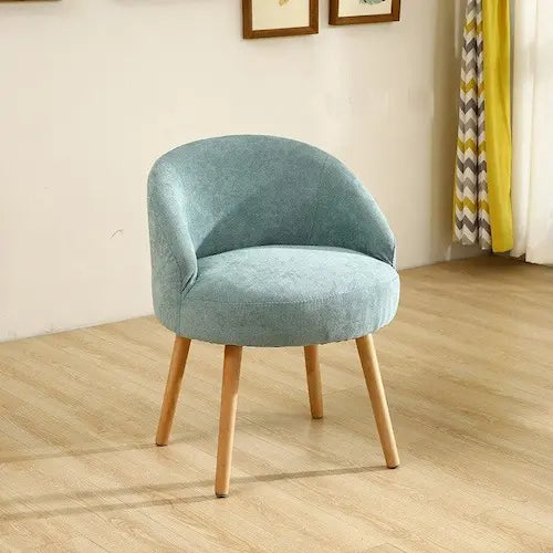 Chaise scandinave en velours et bois style fauteuil