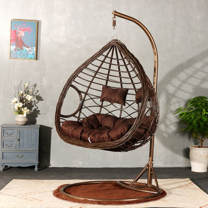 Chaise suspendue en rotin renforcé double coussin et socle en carbone