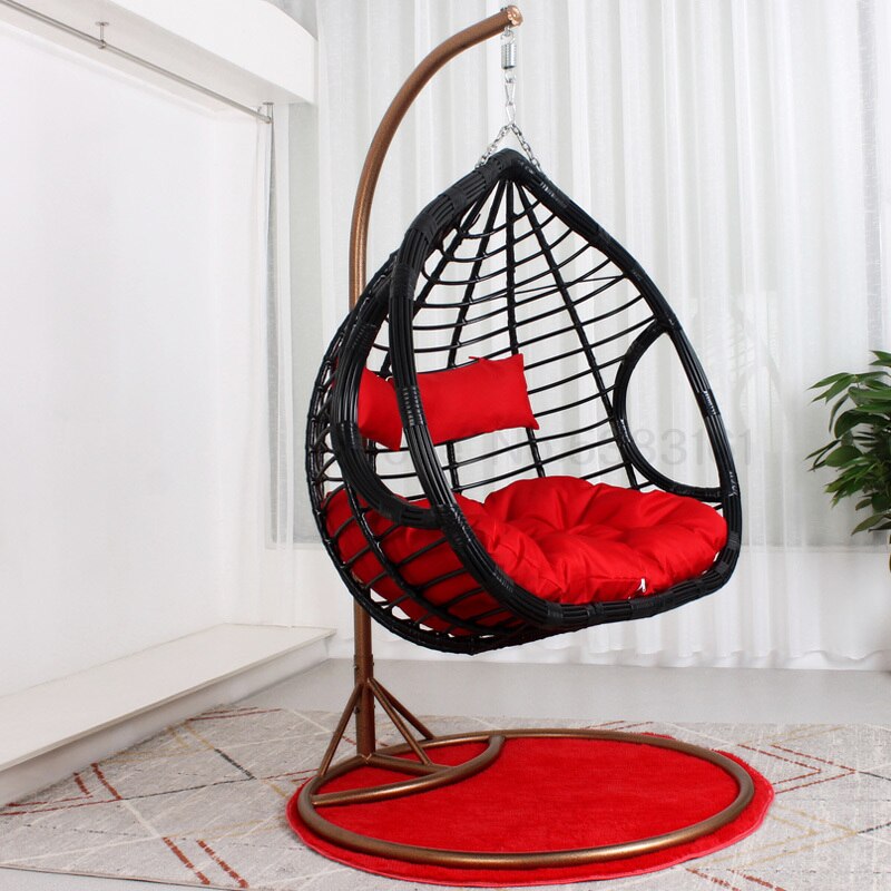 Chaise suspendue en rotin renforcé double coussin et socle en carbone