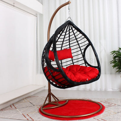 Chaise suspendue en rotin renforcé double coussin et socle en carbone