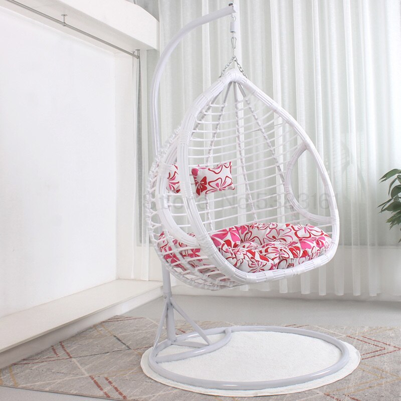 Chaise suspendue en rotin renforcé double coussin et socle en carbone