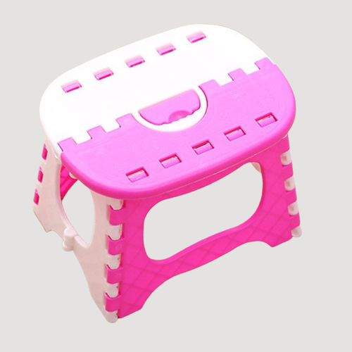 Tabouret enfant pliable et transportable rose et blanc en plastique