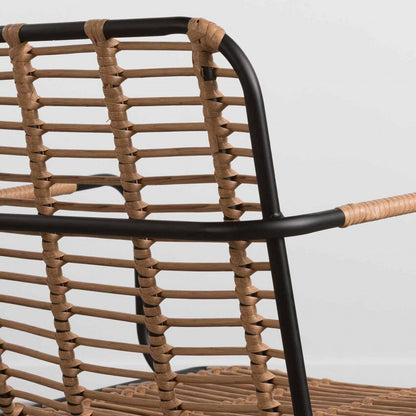 Chaise design en rotin et métal avec accoudoirs