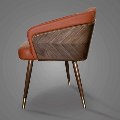 Chaise design en bois de frêne et métal