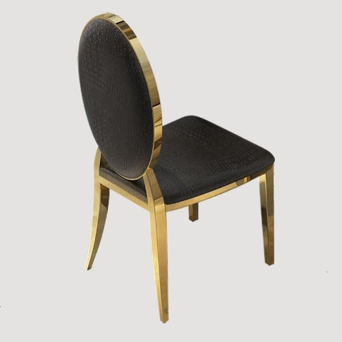 Chaise médaillon design en similicuir noir et cadre doré