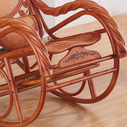 Chaise à bascule en bois vernis et assise en rotin renforcé avec accoudoirs tressés