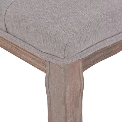 Banc design d'époque en bois et assise capitonnée en tissu gris