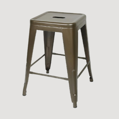Tabouret vintage en métal avec repose pieds