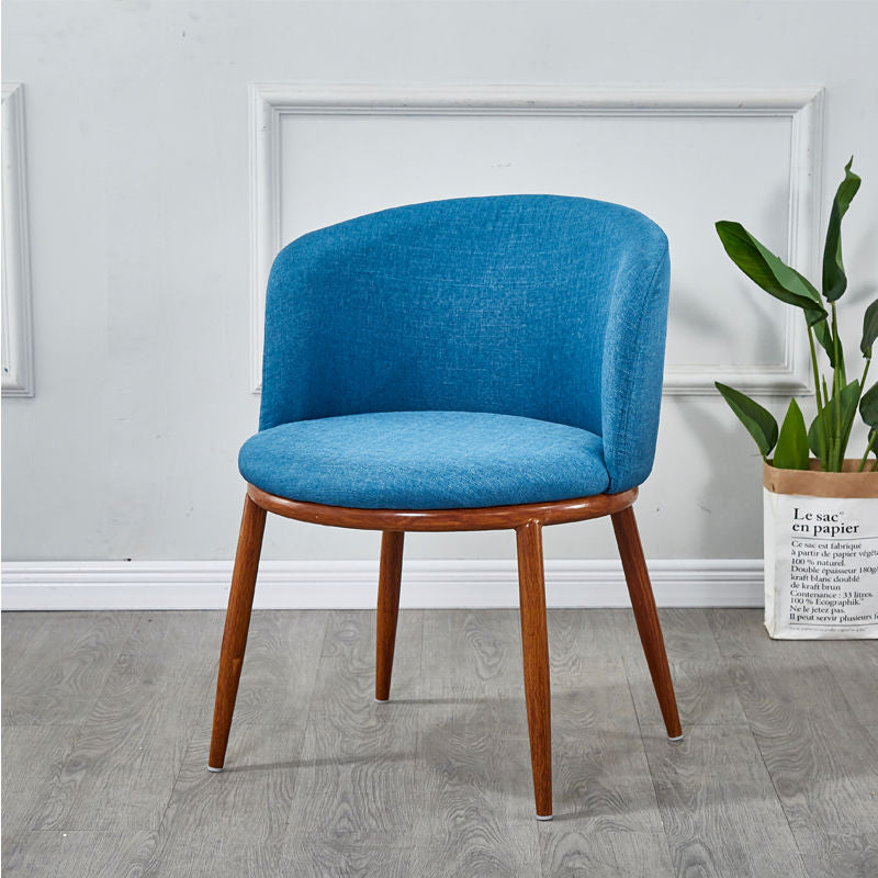 Chaise scandinave à large dossier en tissu bleu turquoise et bois