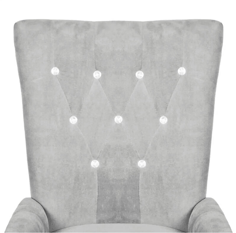 Chaise moderne en velours gris clair capitonnée et bois noir