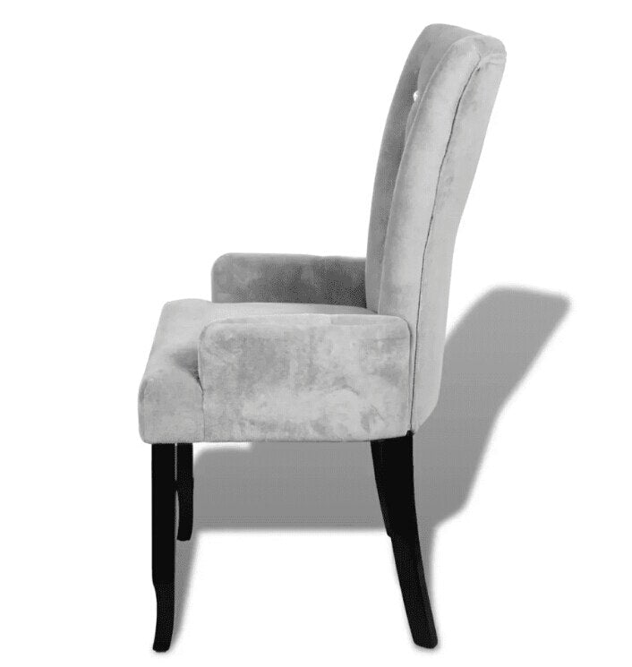 Chaise moderne en velours gris clair capitonnée et bois noir