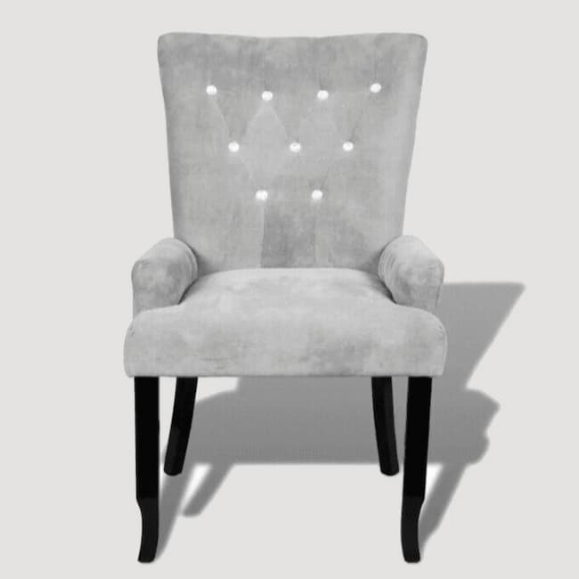 Chaise moderne en velours gris clair capitonnée et bois noir