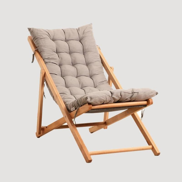 Chaise longue pliable en bois avec coussin beige matelassé