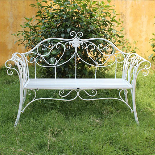 Banc industriel en fer blanc avec arabesques