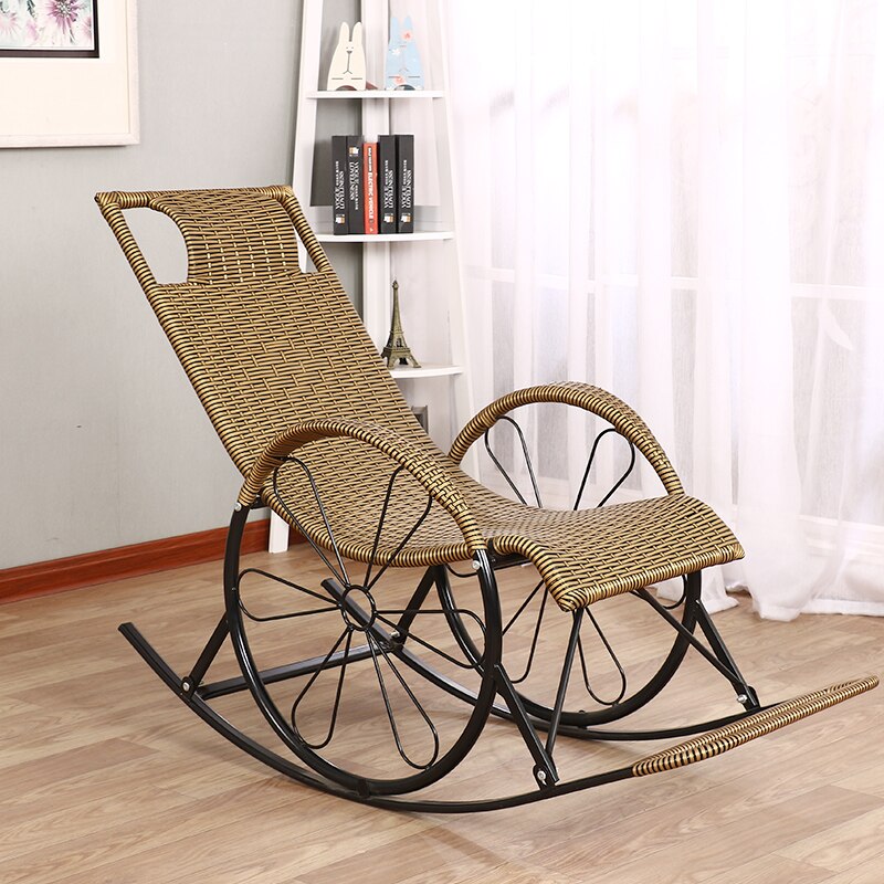 chaise à bascule en fer et rotin