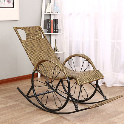 chaise à bascule en fer et rotin