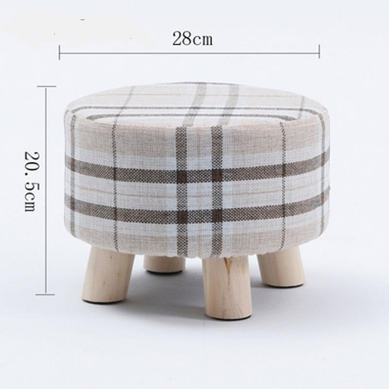 Tabouret scandinave bas avec assise ronde en tissus