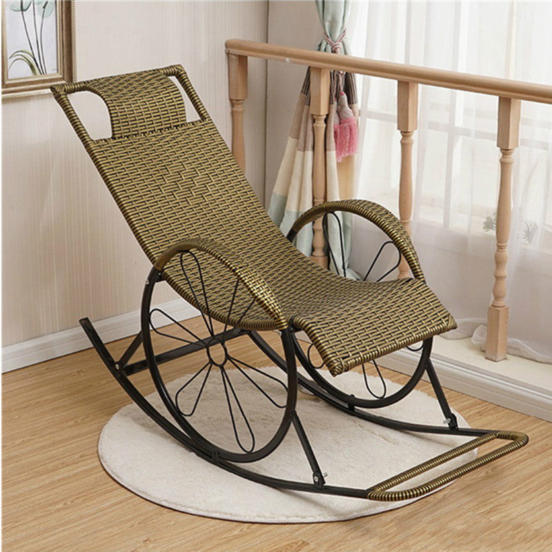 chaise à bascule en fer et rotin