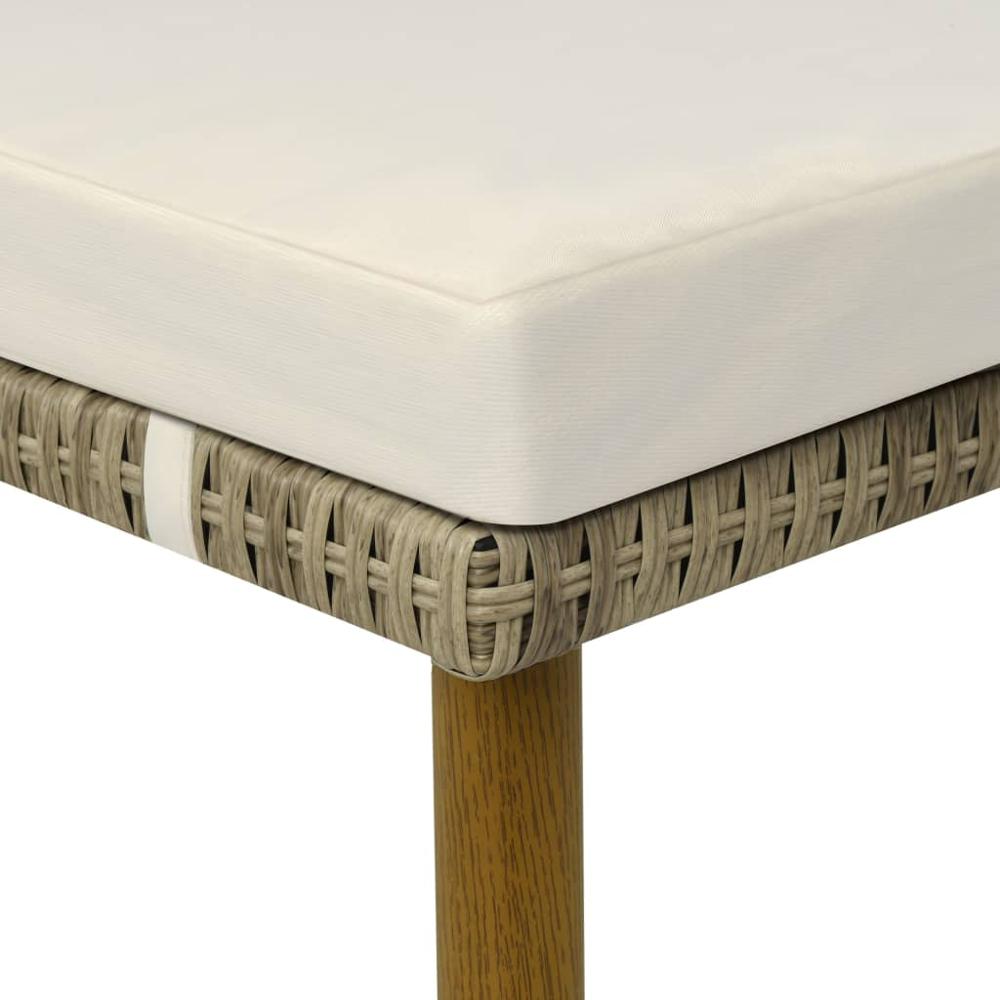 Transat en rotin sur pieds en bois