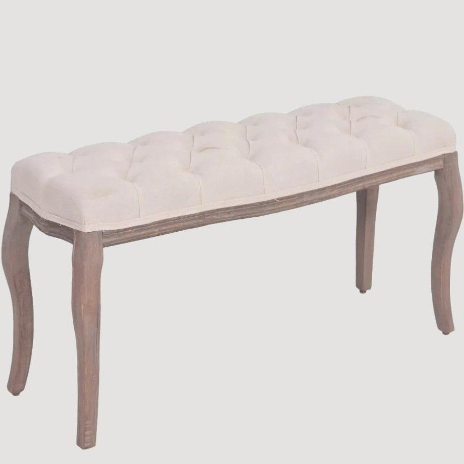 Banc design de style ancien en bois et assise en tissu beige capitonnée 