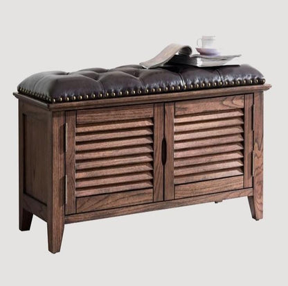 Banc de rangement en bois et cuir capitonné 
