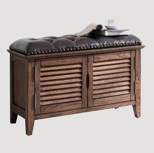 Banc de rangement en bois et cuir capitonné 