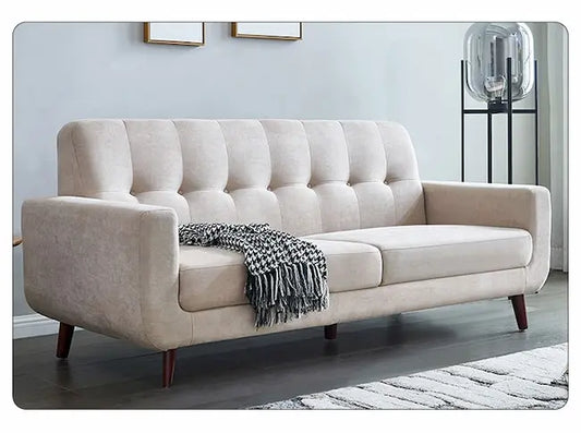 Canapé scandinave capitonné pieds marrons tissu crème