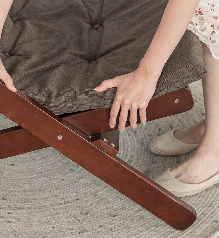 Chaise pliable en bois avec assise matelassée