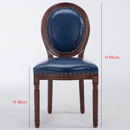 Chaise médaillon en bois massif et cuir