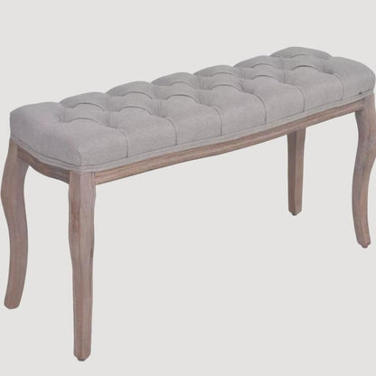 Banc design en bois et assise en tissus gris capitonnée 