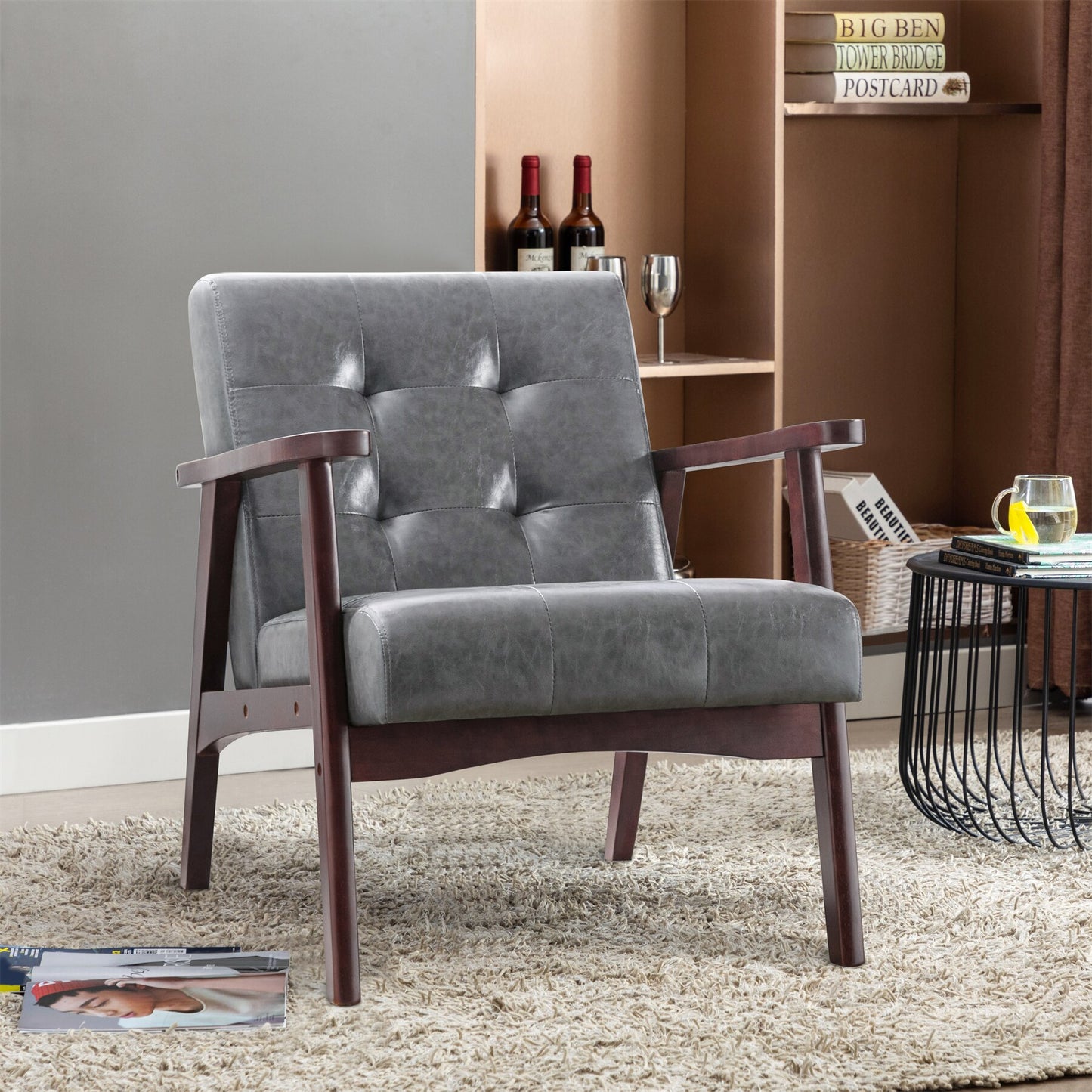 Fauteuil capitonné gris 