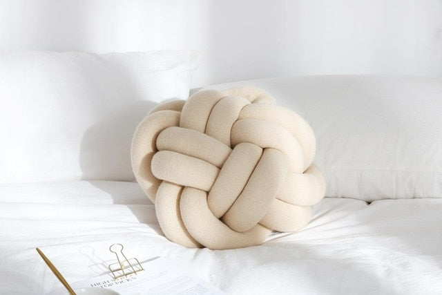 Coussin en forme de noeud