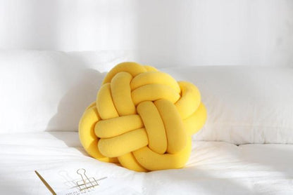 Coussin en forme de noeud