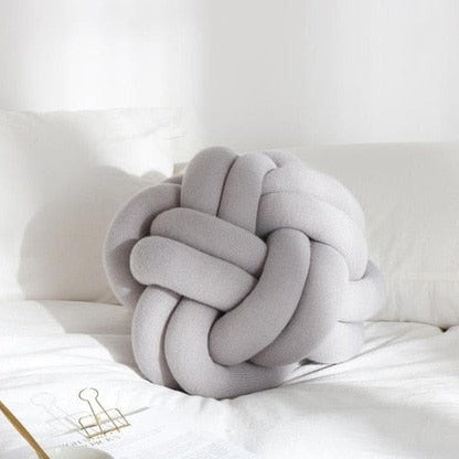Coussin en forme de noeud