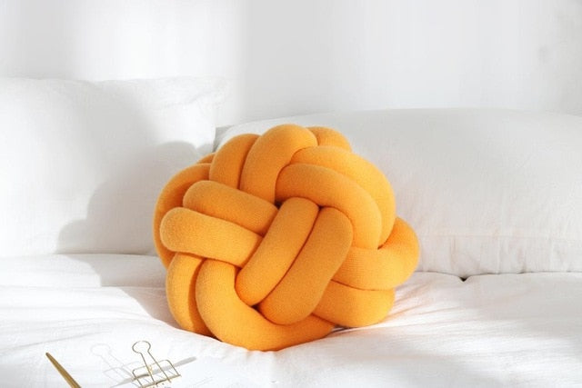 Coussin en forme de noeud