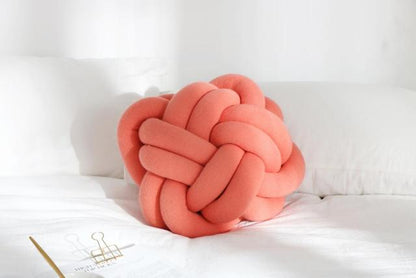 Coussin en forme de noeud