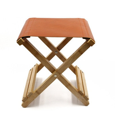 Tabouret pliant vintage en cuir et bois de bambou