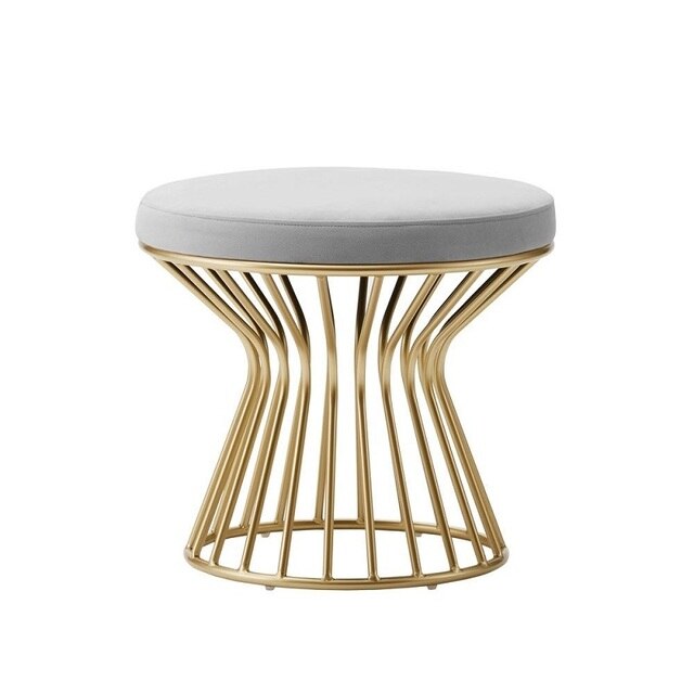 Tabouret design bas avec pied large à barreaux en métal doré