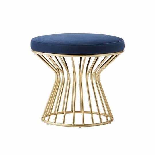 Tabouret design bas avec pied large à barreaux en métal doré