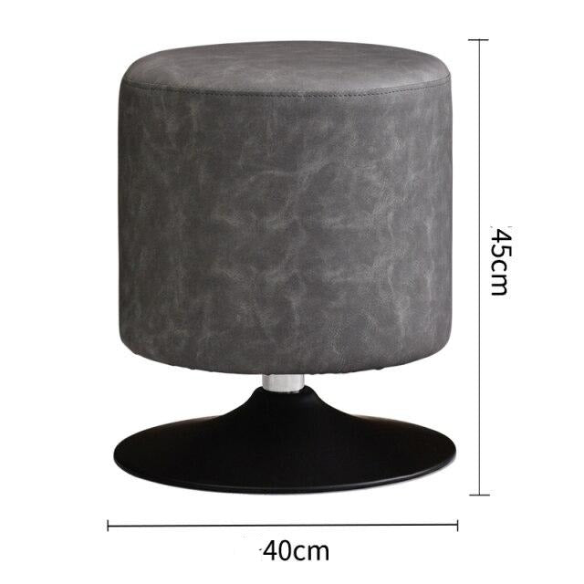 Tabouret design bas en résine de cuir végétal sur pied circulaire