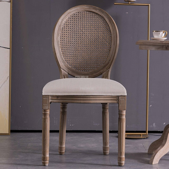 Chaise médaillon empereur en bois et rotin avec accoudoirs