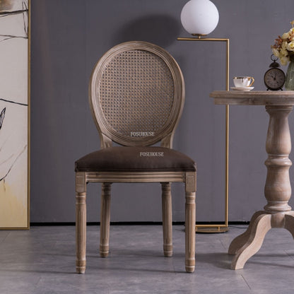 Chaise médaillon empereur en bois et rotin avec accoudoirs