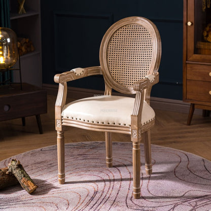 Chaise médaillon empereur en bois et rotin avec accoudoirs
