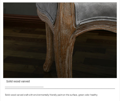 Fauteuil vintage capitonné impérial