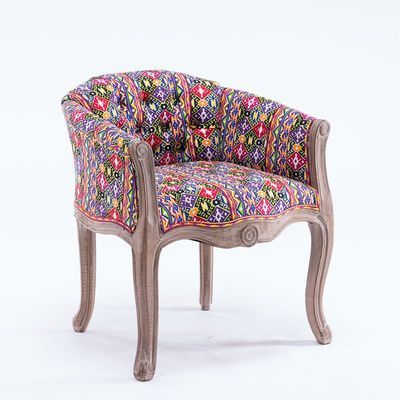 Fauteuil vintage capitonné impérial