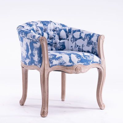 Fauteuil vintage capitonné impérial